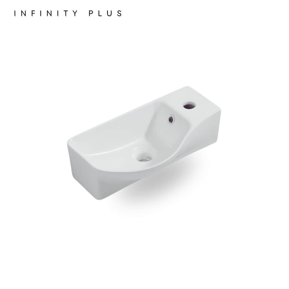 A white ceramic wall-mounted sink basin with a single faucet hole, shown at an angle on a clean white background with the text 'INFINITY PLUS' in the top left corner.