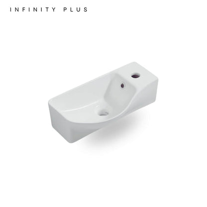 A white ceramic wall-mounted sink basin with a single faucet hole, shown at an angle on a clean white background with the text 'INFINITY PLUS' in the top left corner.